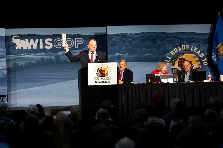 Wisconsin Congressman Tom Tiffany holds up egg carton